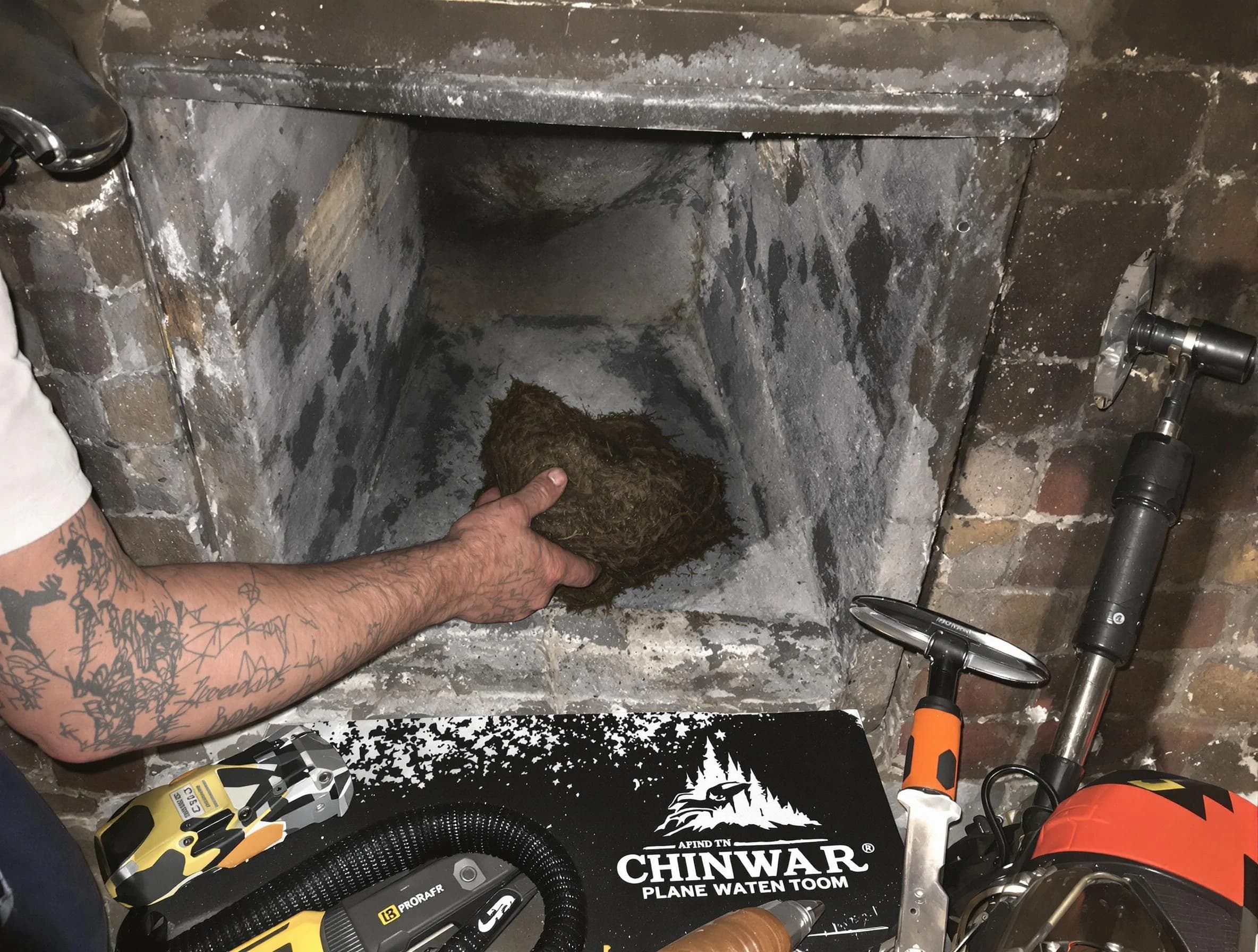 Emporia Chimney Sweep safely removing debris and screening chimney in Emporia, VA